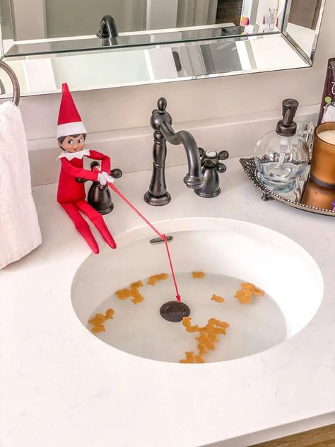 Elf fishing in the sink